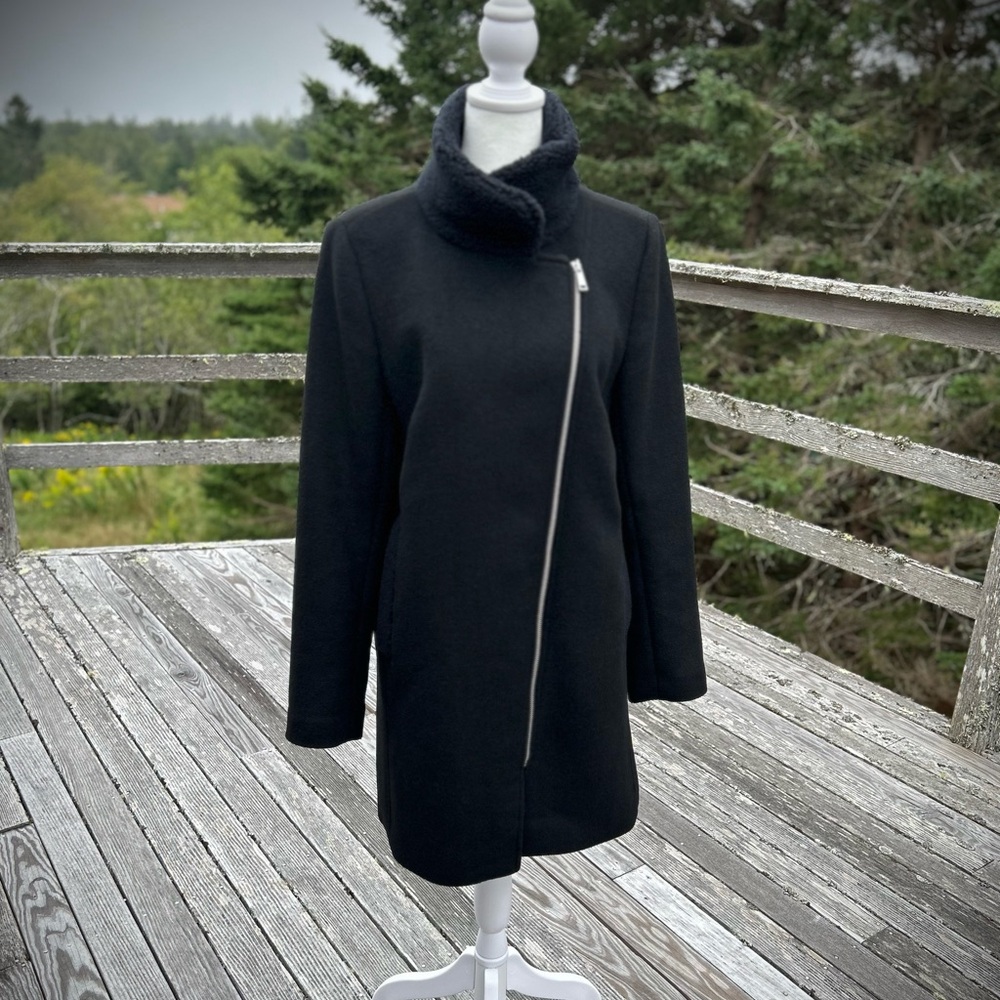 Barely worn, bought for a wedding 5 years ago but it is slightly too big.